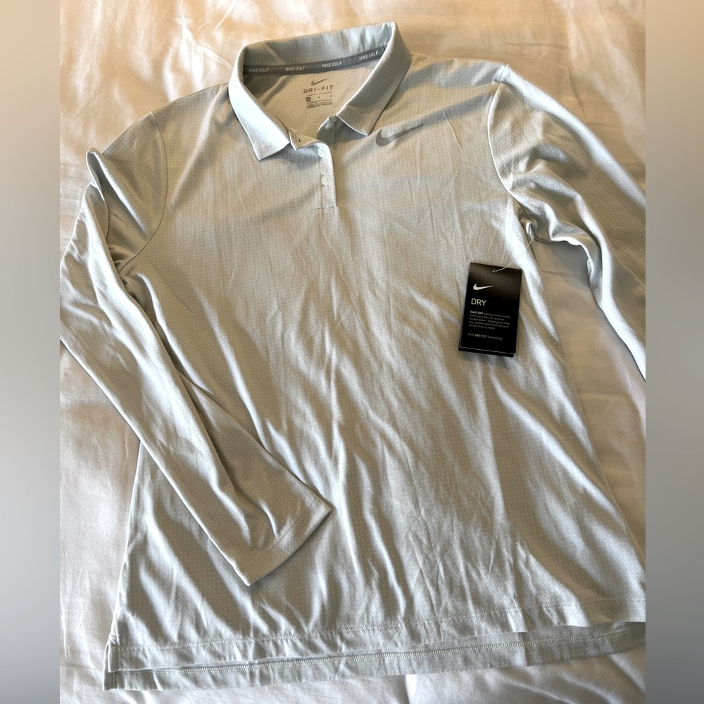 Nike Women’s long sleeve golf shirt, new with tags
